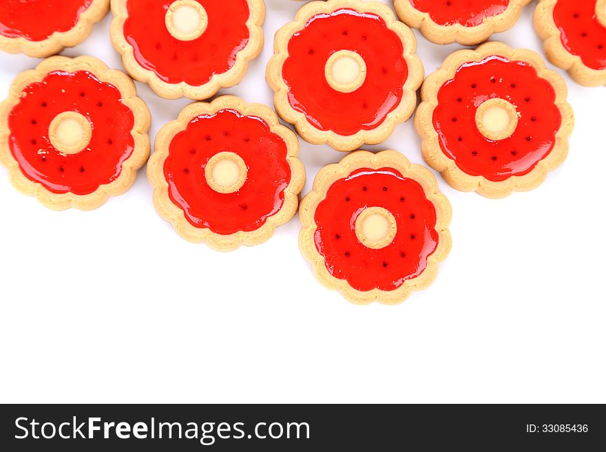 Lot of strawberry biscuits. Cllose up. White background.