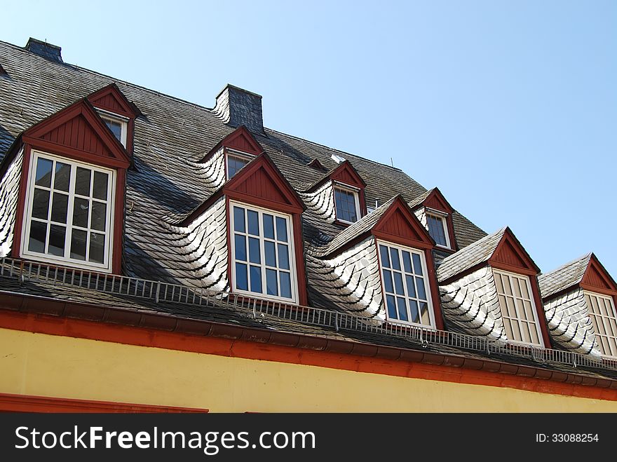 Artisanal German slate roof with dormer windows