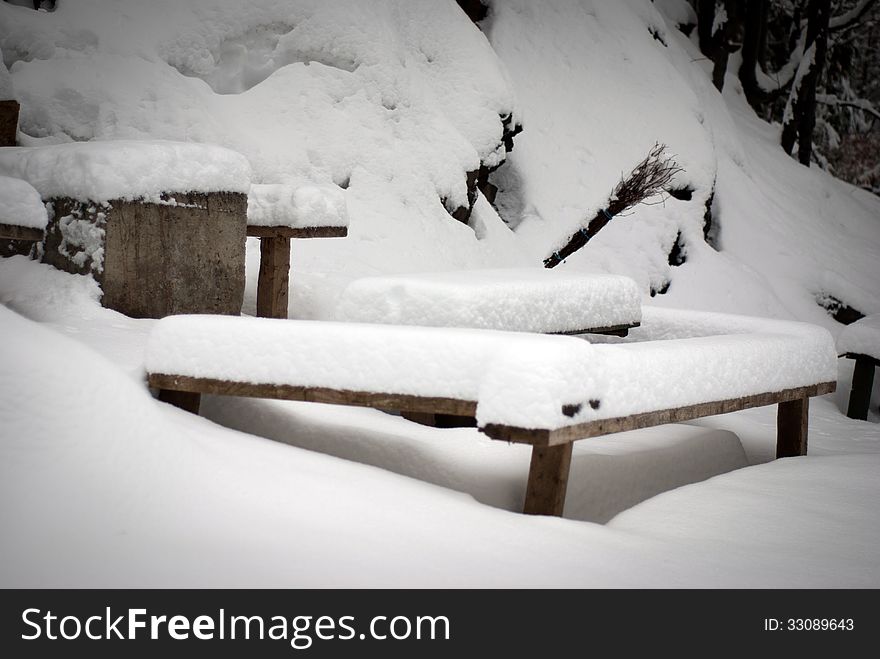 Snowy furniture in the cold winter