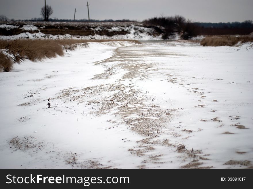 Frozen river bank in winter time. Frozen river bank in winter time