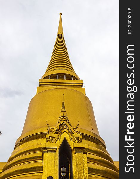 Goldplated chedi on the upper terrace of the Grand Palace in Bangkok is the eyecatcher of Bangkok's main historical tourist attraction. Goldplated chedi on the upper terrace of the Grand Palace in Bangkok is the eyecatcher of Bangkok's main historical tourist attraction.