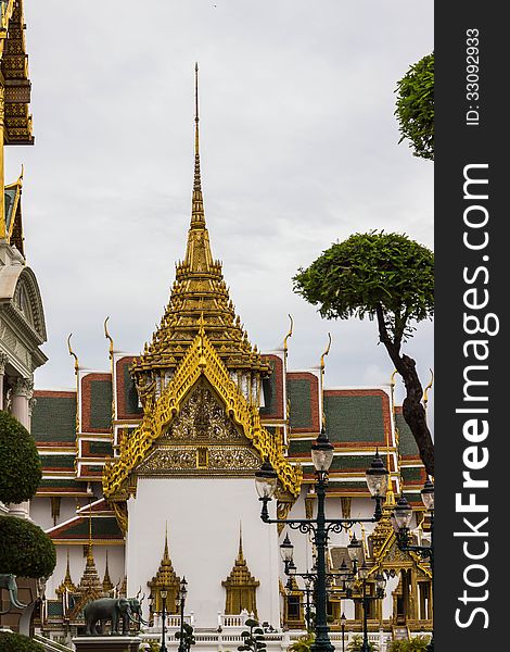 Beautiful building (Rajkaranyasapha hall) next to the Grand Palace in Bangkok, symbolizing the wealth and royal power in Thailand. Beautiful building (Rajkaranyasapha hall) next to the Grand Palace in Bangkok, symbolizing the wealth and royal power in Thailand.