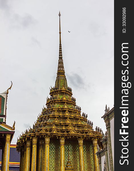 One of the many highly decorated buildings on the upper terrace of the Grand Palace in Bangkok. One of the many highly decorated buildings on the upper terrace of the Grand Palace in Bangkok.