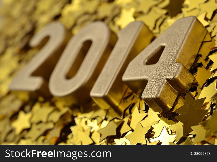 2014 year golden figures on the background of golden stars