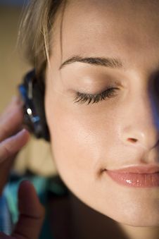 A Woman Listening To Music Stock Photos
