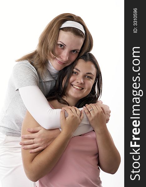 Two female friends hugging