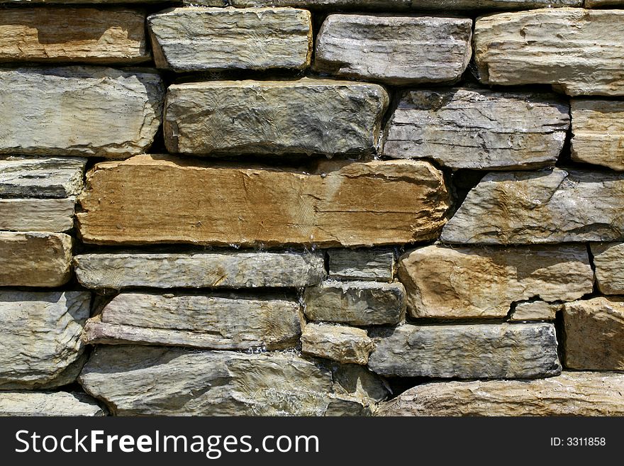 Water Running Over Wet Rock Background. Water Running Over Wet Rock Background.