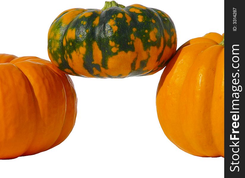 3 pumpkins isolated stacked on top of each other forming a border or frame.