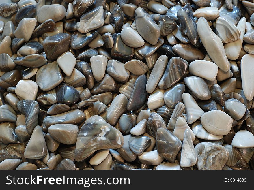 Grey pebbles, stone background, natural minerals