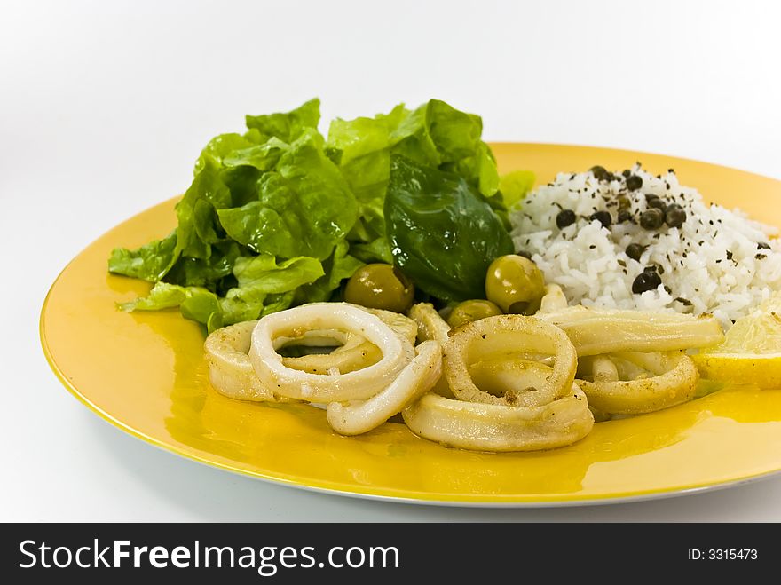 Deep fried squid fish with lettuce.