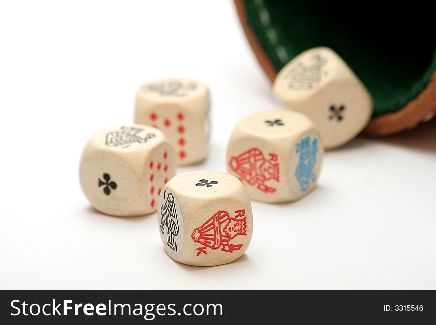 Five poker dice against white background and dice cup, showing a full-house. Five poker dice against white background and dice cup, showing a full-house.