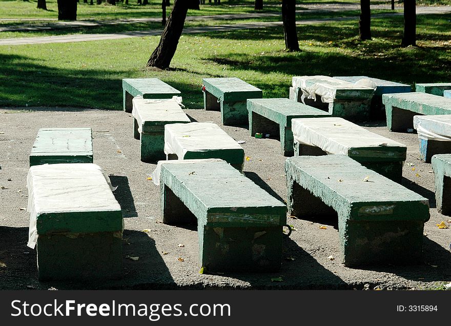 Concrete skameyi in a city park. Concrete skameyi in a city park