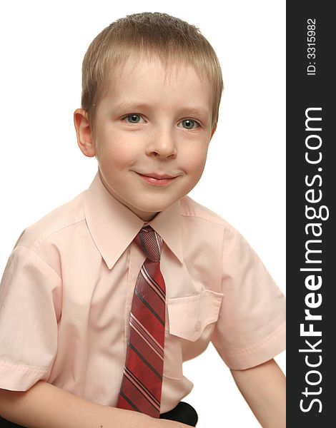 The happy boy on a white background