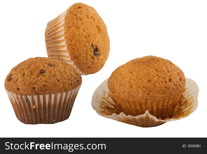 Three muffins isolated on white