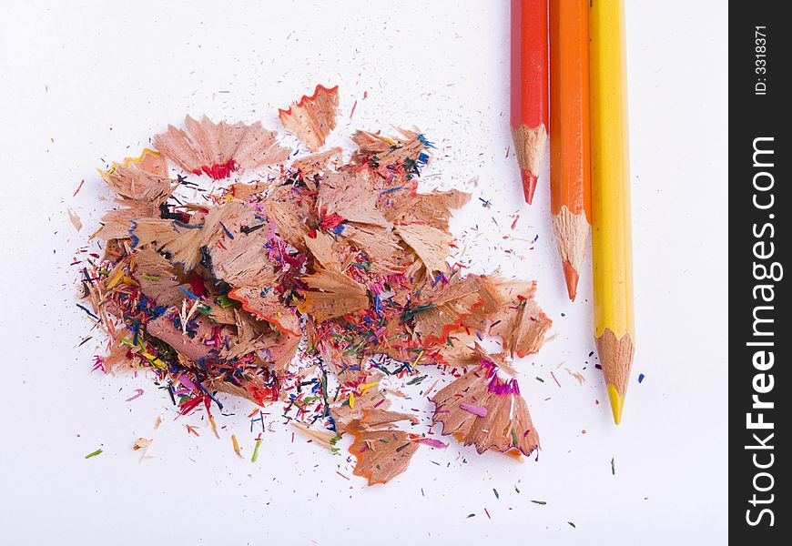 Coloured pencils and shavings
 on a white background