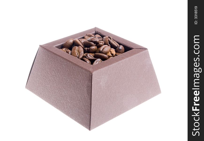 Coffee beans in the brown box on the white background