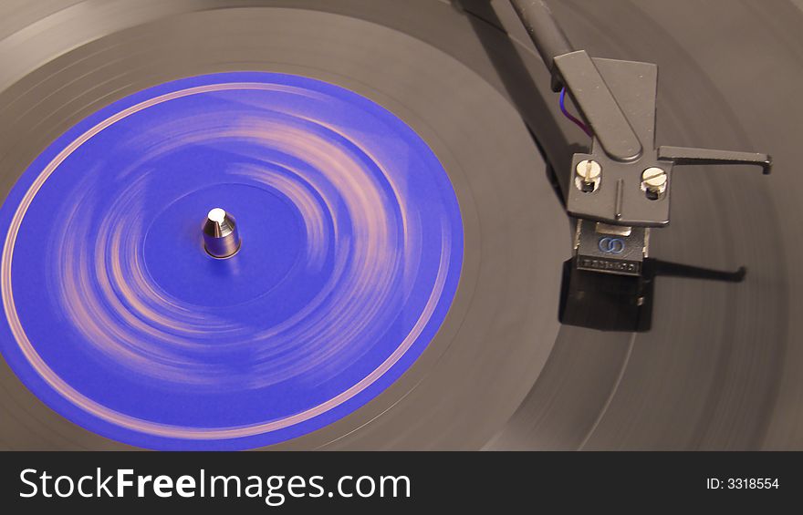 Phonograph record with a plate