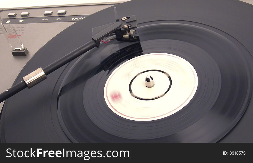 Phonograph record on a white background