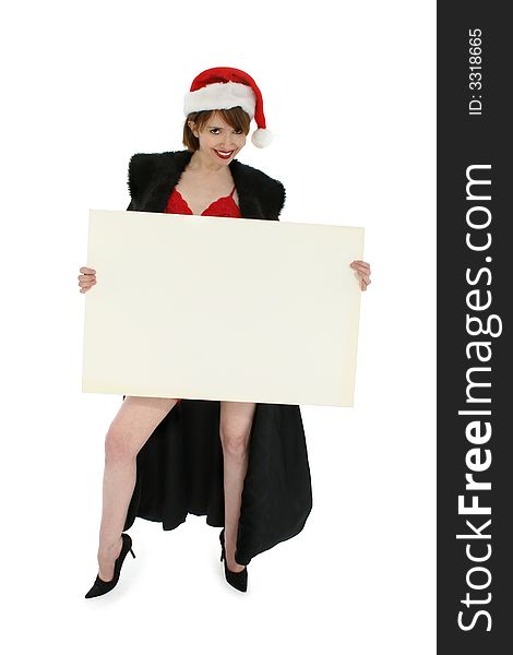 Sexy thirty something woman dressed in holiday lingerie holding blank sign.  clipping path included. Sexy thirty something woman dressed in holiday lingerie holding blank sign.  clipping path included