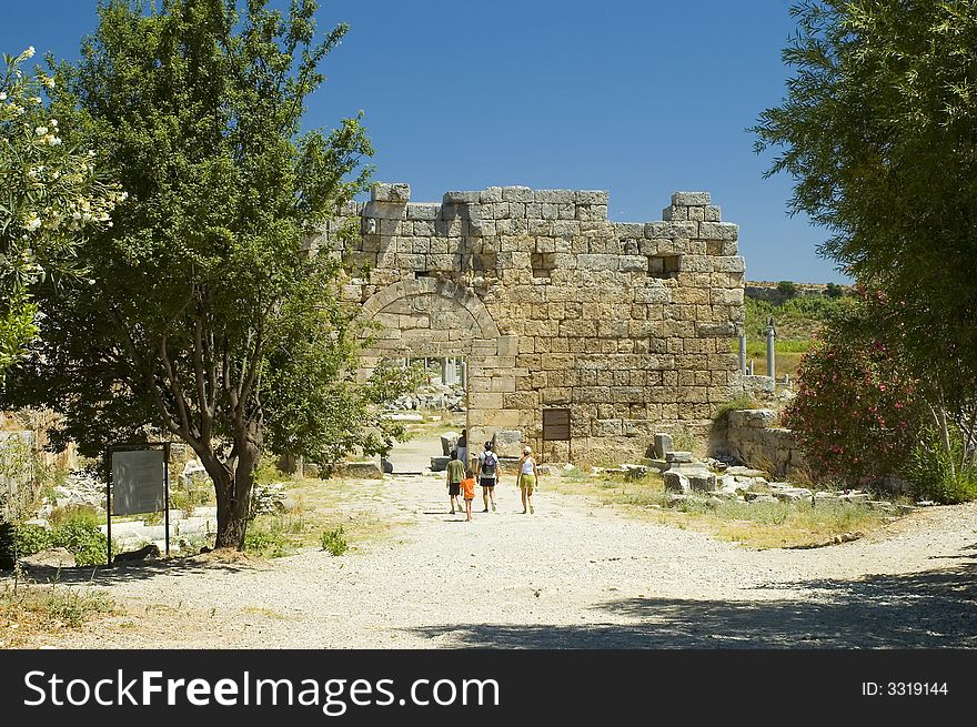 Tourists visiting old ancient ruins in Turkey