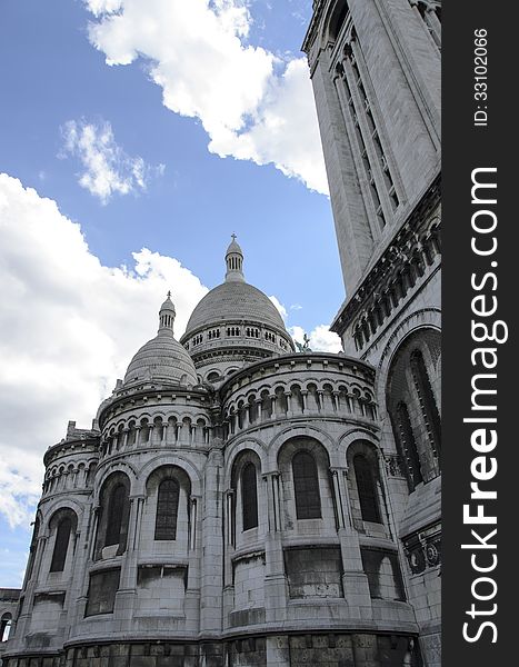 The Basilica of the Sacred Heart of Paris, commonly known as SacrÃ©-CÅ“ur Basilica (French: Basilique du SacrÃ©-CÅ“ur, pronounced, is a Roman Catholic church and minor basilica, dedicated to the Sacred Heart of Jesus, in Paris, France. A popular landmark, the basilica is located at the summit of the butte Montmartre, the highest point in the city. SacrÃ©-CÅ“ur is a double monument,. The Basilica of the Sacred Heart of Paris, commonly known as SacrÃ©-CÅ“ur Basilica (French: Basilique du SacrÃ©-CÅ“ur, pronounced, is a Roman Catholic church and minor basilica, dedicated to the Sacred Heart of Jesus, in Paris, France. A popular landmark, the basilica is located at the summit of the butte Montmartre, the highest point in the city. SacrÃ©-CÅ“ur is a double monument,