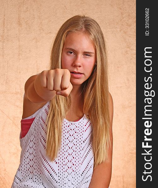 Young Girl With Angry Fist