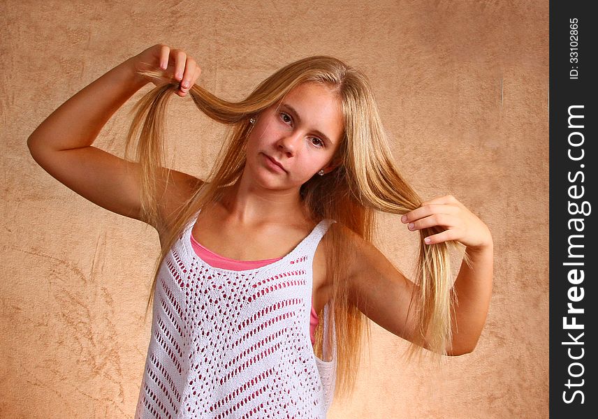Young Girl Holding Hair