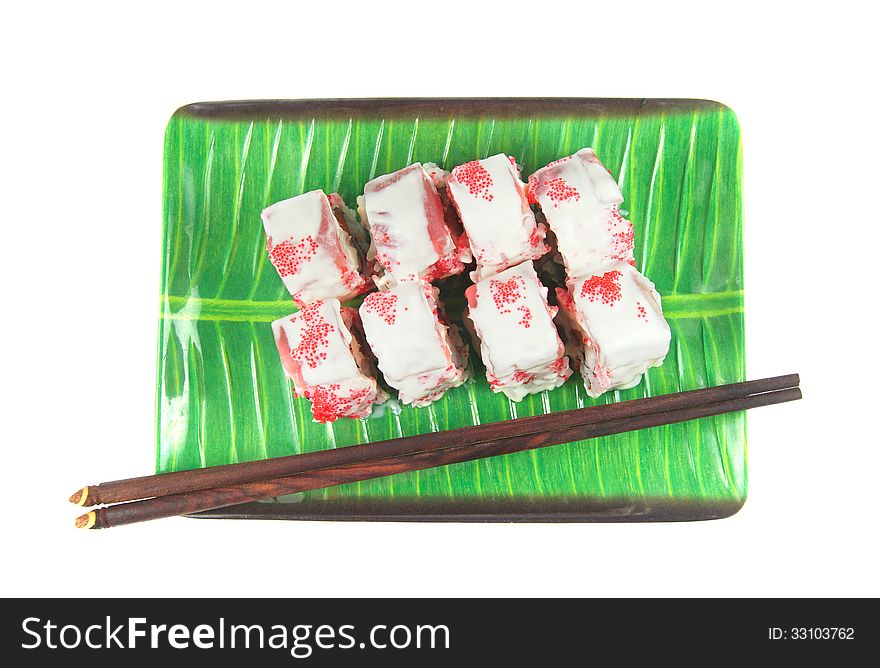 Rolls on a plate with sticks isolated on a white background