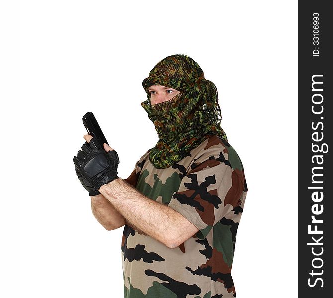 Man in camouflage with handgun. Isolated on white background. Man in camouflage with handgun. Isolated on white background