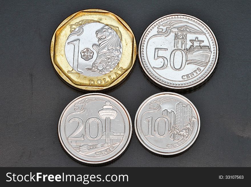 The new Singapore coins (Bi-metallic dollar and others, only lacking the new 5 cents coin). The new Singapore coins (Bi-metallic dollar and others, only lacking the new 5 cents coin)