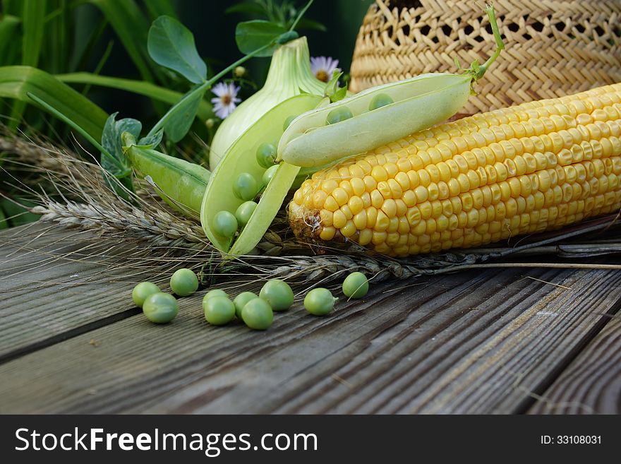 Green Peas, Corn, Wheat And Straw Hat.