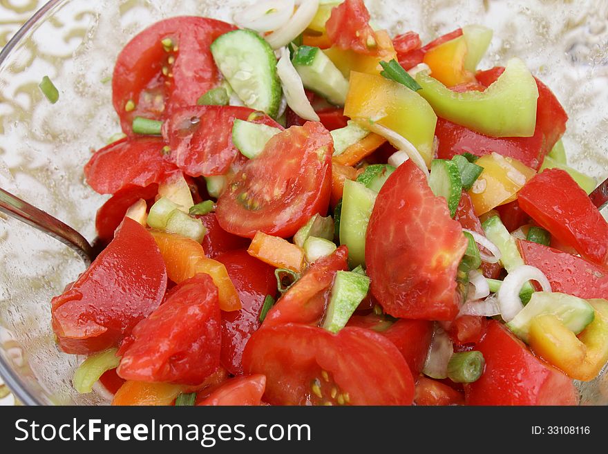 Summer salad of fresh vegetables. Whole background.