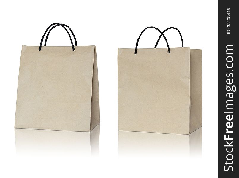 Brown paper bag on reflect floor and white background. Brown paper bag on reflect floor and white background