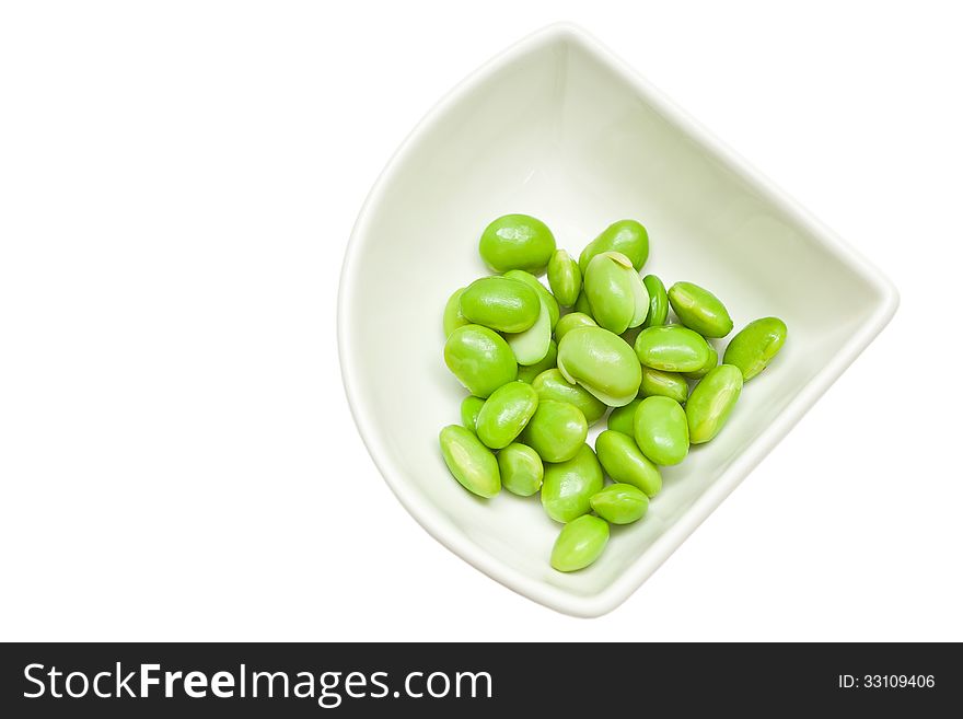 Green soybean seeds isolated on white