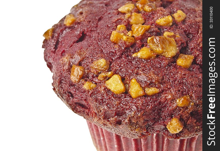 Closeup detail of red almond muffin cake. Closeup detail of red almond muffin cake