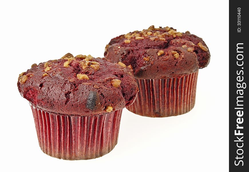 Two red almond muffin cake on white background. Two red almond muffin cake on white background