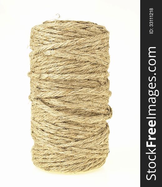 Isolated image of brown hemp rope roll