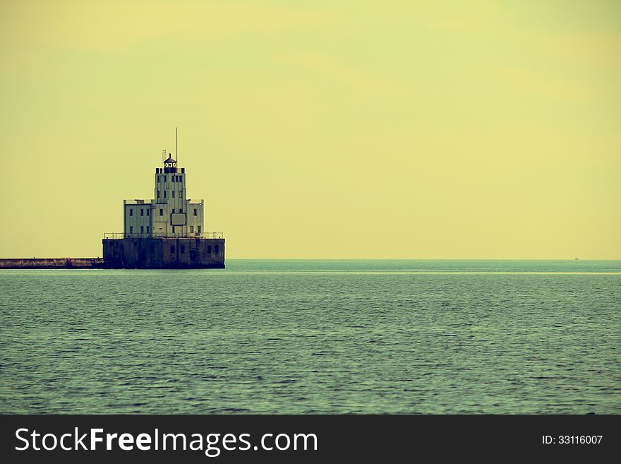 Old building of lighthouse on Lake Michigan