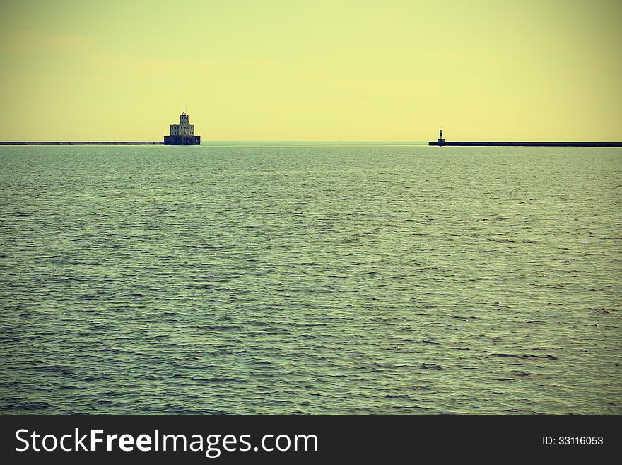 Lighthouse on Lake Michigan with calm water