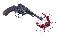 Gun With Berries Like Blood Stock Photography