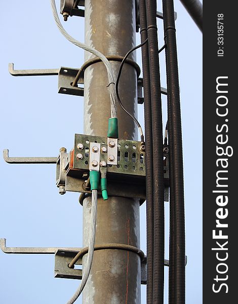 Grounding Point Cable on telephone poles. Grounding Point Cable on telephone poles.