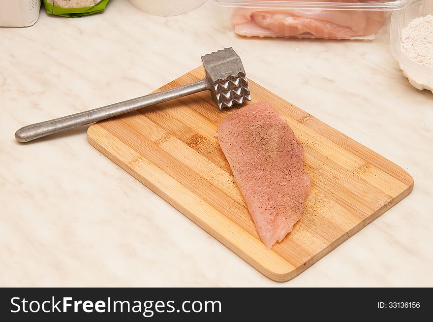 Preparing chicken fillet meat for cooking. Preparing chicken fillet meat for cooking