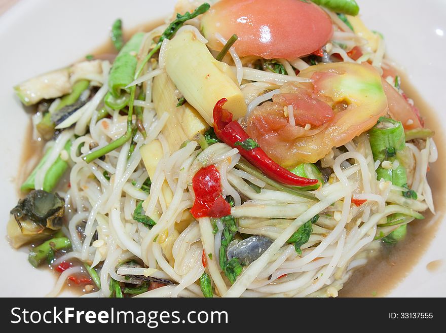 Papaya salad (Som Tum) is a local Thai food