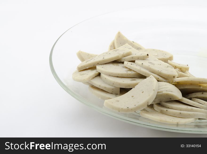 Vietnamese sausage in clean dish on white background. Vietnamese sausage in clean dish on white background