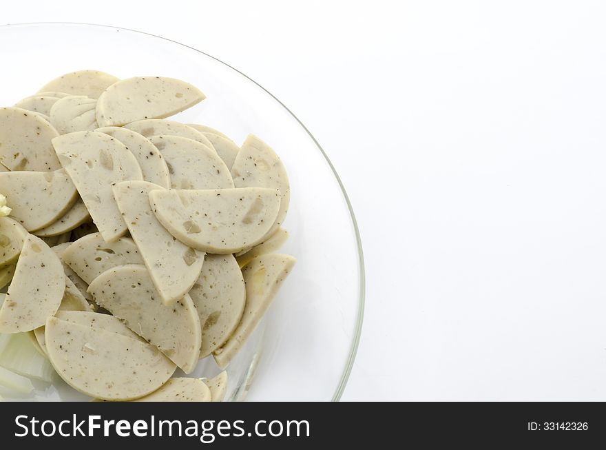 Vietnamese sausage in clean dish on white background. Vietnamese sausage in clean dish on white background