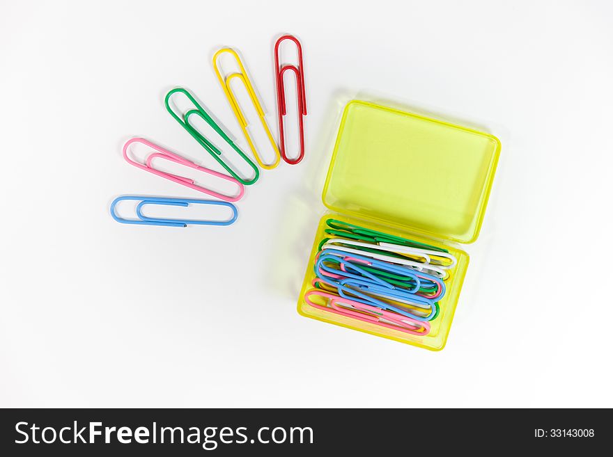 Box and paperclip on the white background. Box and paperclip on the white background