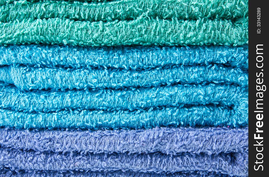 Colorful towels isolated on white background