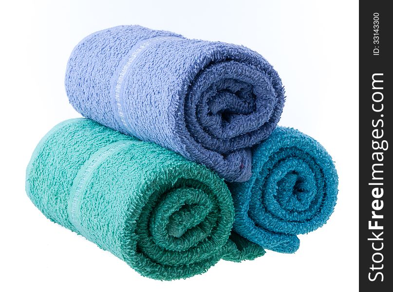 Colorful towels isolated on white background