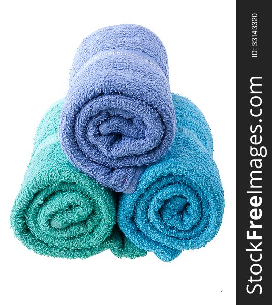 Colorful towels isolated on white background