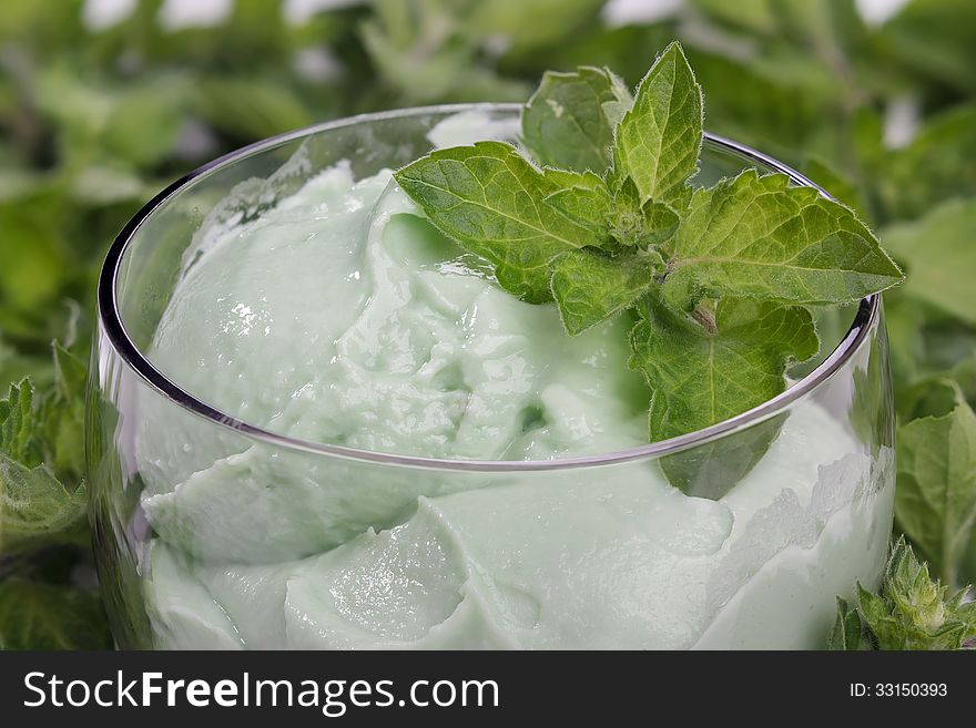 Soft ice cream with mint in glass cups